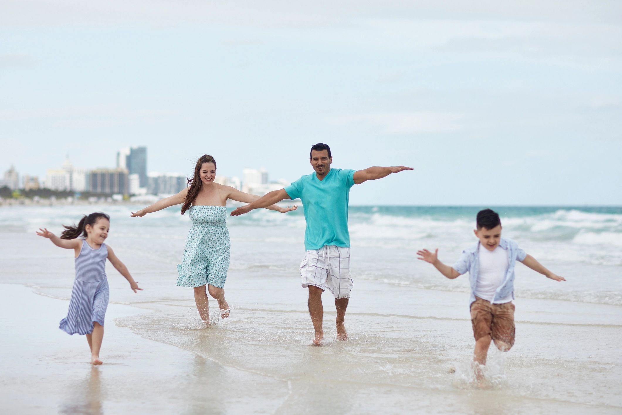 Family playing in the surf on a Florida beach