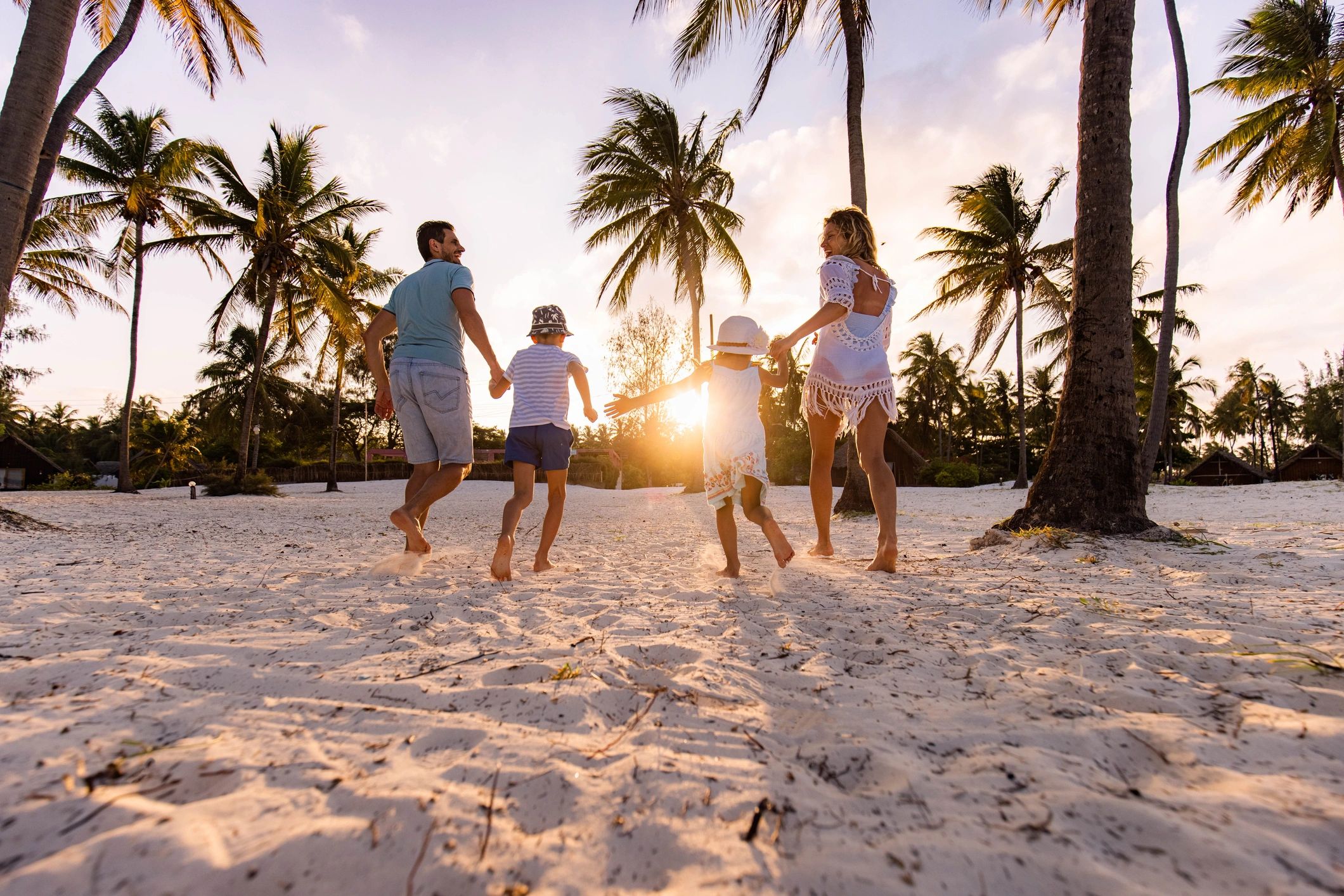 Traveler testimonial image with family on beach