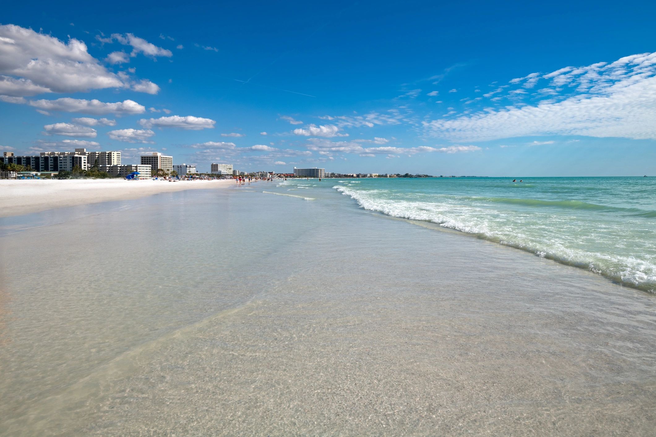 Wide white sand beach scene at Siesta Key Beach