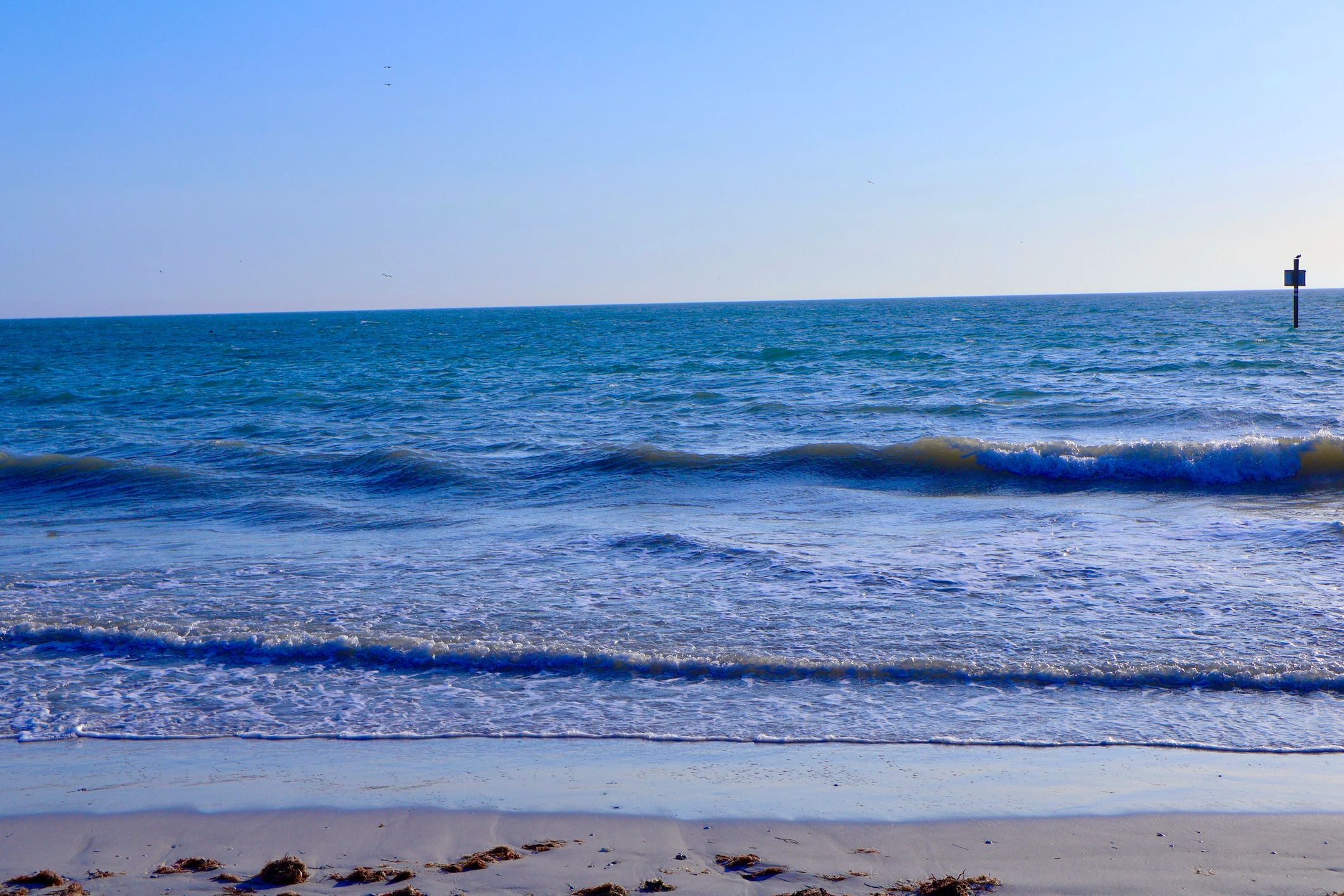 Tranquil sandy shoreline representing Boca Grande Beach